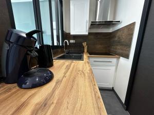Appartements La Suite Porcelaine, calme et chic : photos des chambres