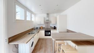Maisons de vacances Magnifique maison avec Jardin : photos des chambres