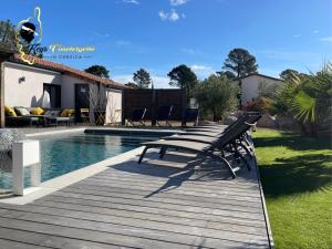 Villas Villa Plein pied 8 pers piscine chauffee privee proche plage San Cipriano Cala Rossa Climatisation WIFI : photos des chambres