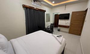 FabHotel Navya Grand