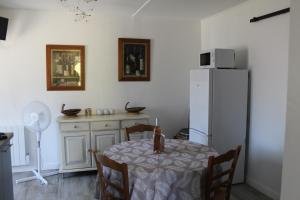 Appartements la villa des six ifs- L'olivier : photos des chambres