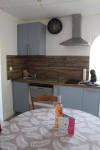 Appartements la villa des six ifs- L'olivier : photos des chambres