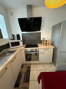 Appartements Love You Suite Romantique Spa 25min du futuroscope : photos des chambres