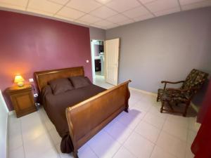 Maisons de vacances Au bord des jardins : photos des chambres