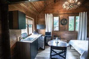 Sejours a la campagne Wooden Lodge : photos des chambres