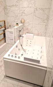 Appartements Les Bons Enfants Balneo : photos des chambres