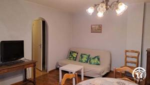 Maisons de vacances Au centre du village : photos des chambres