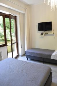 Chambre Triple - Vue sur Jardin