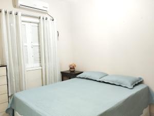 Casa Cond 2Q com Churrasqueira