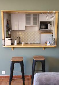 Appartements Joli studio 2 pas du port, clim et au calme : photos des chambres