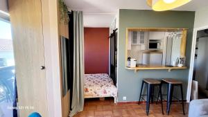 Appartements Joli studio 2 pas du port, clim et au calme : photos des chambres