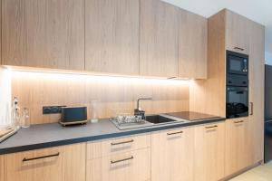 Appartements L-Auberge - Appartement 3 chambres avec sauna : photos des chambres