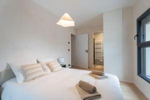 Appartements L-Auberge - Appartement 3 chambres avec sauna : photos des chambres