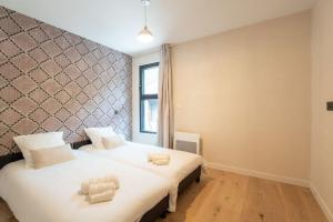 Appartements L-Auberge - Appartement cosy 3 chambres : photos des chambres