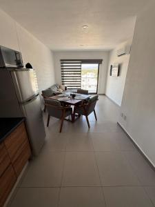 Bonito y Comodo Departamento con Alberca cerca de la Playa