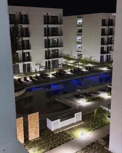 Bonito y Comodo Departamento con Alberca cerca de la Playa