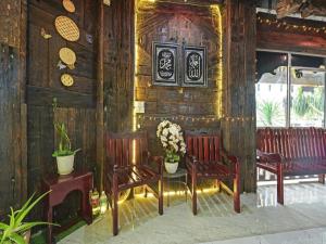 Super OYO Capital O 90659 Raintown Timbers Hotel