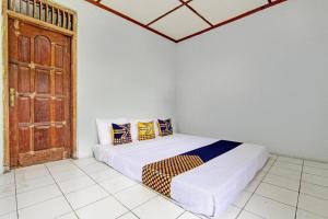 SPOT ON 93592 Pondok Backpackers Ardafa Jogja