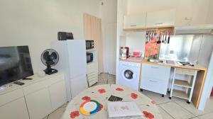 Appartements Aigue Marine et Coquelicot : photos des chambres