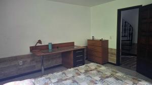 Quarto em casa na Mata Atlântica