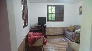 Quarto em casa na Mata Atlântica