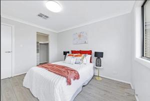 Center of Rouse Hill house with fully fenced back yard