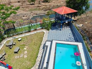 Sunils villa with private pool, Machan and play area in Karjat