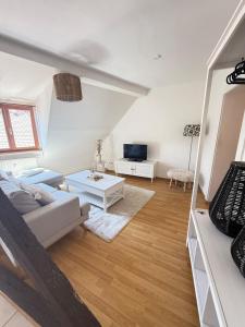 Appartements Charme et Confort, plein centre : photos des chambres