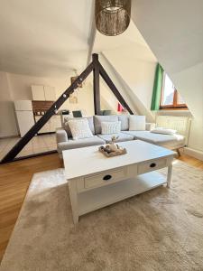 Appartements Charme et Confort, plein centre : photos des chambres