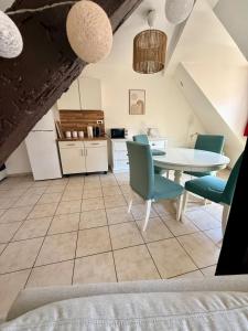 Appartements Charme et Confort, plein centre : photos des chambres