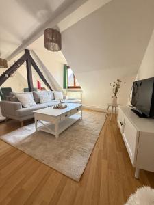 Appartements Charme et Confort, plein centre : photos des chambres