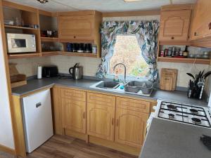 Hilltop Hideaway 2 Bed Caravan with Panoramic Town Scenery in Aberystwyth Holiday Village F8