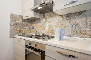 GuestHost-Storie di Lava e lAngolo dellElefante Apartments