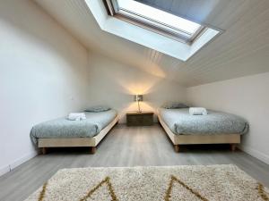 Appartements Duplex COSY - familial spacieux : photos des chambres