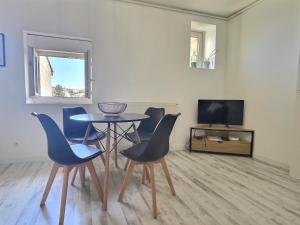 Appartements Le thannaron - Centre ville : photos des chambres