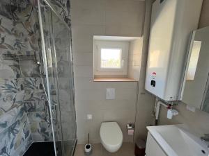 Appartements Maison des Fleurs T2 COSY : photos des chambres