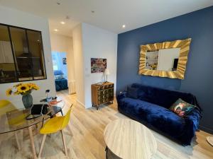 Appartements Maison des Fleurs T2 COSY : photos des chambres