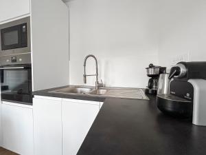 Appartements Aux portes de Lille, grand T3 avec balcon et Wi-Fi : photos des chambres