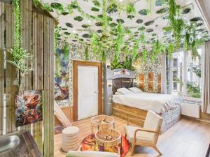 Appartements Jurassic Park - Cabane immersive : photos des chambres