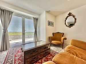 The Sandcastle. Private steps onto a sandy beach