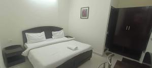 Hotel O Shimla Bypass Road ISBT Dehradun Formerly Benison Guest House