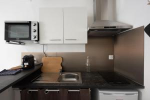 Appartements Studio Romarin : photos des chambres