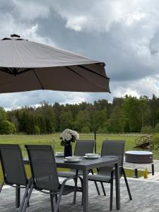 Golden House - Mazury