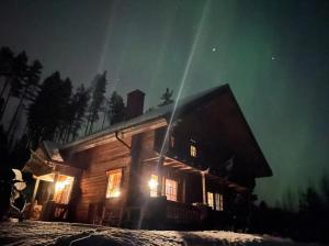 Glamping tent in a forest, lake view