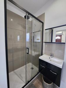 Appartements Charmant studio equipe a Elbeuf : photos des chambres