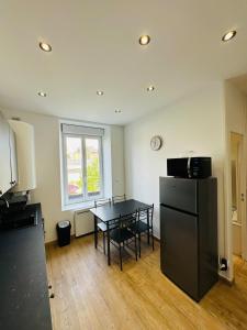Appartements La Halte Carolo : photos des chambres