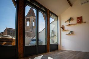 Appartements Le Nid du Clocher : photos des chambres
