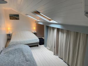 Maisons de vacances D-Day Cottage La Maove : photos des chambres