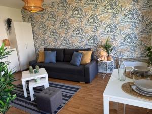 Appartements ღ Jumanji - Proche Parc et Commodites & Wifi : photos des chambres