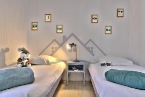 Maisons de vacances LocaLise - M26B - Les Belles Ames - Maison renovee avec jardin entierement clos - place de parking sur le terrain - wifi inclus - draps inclus - animaux bienvenus : photos des chambres